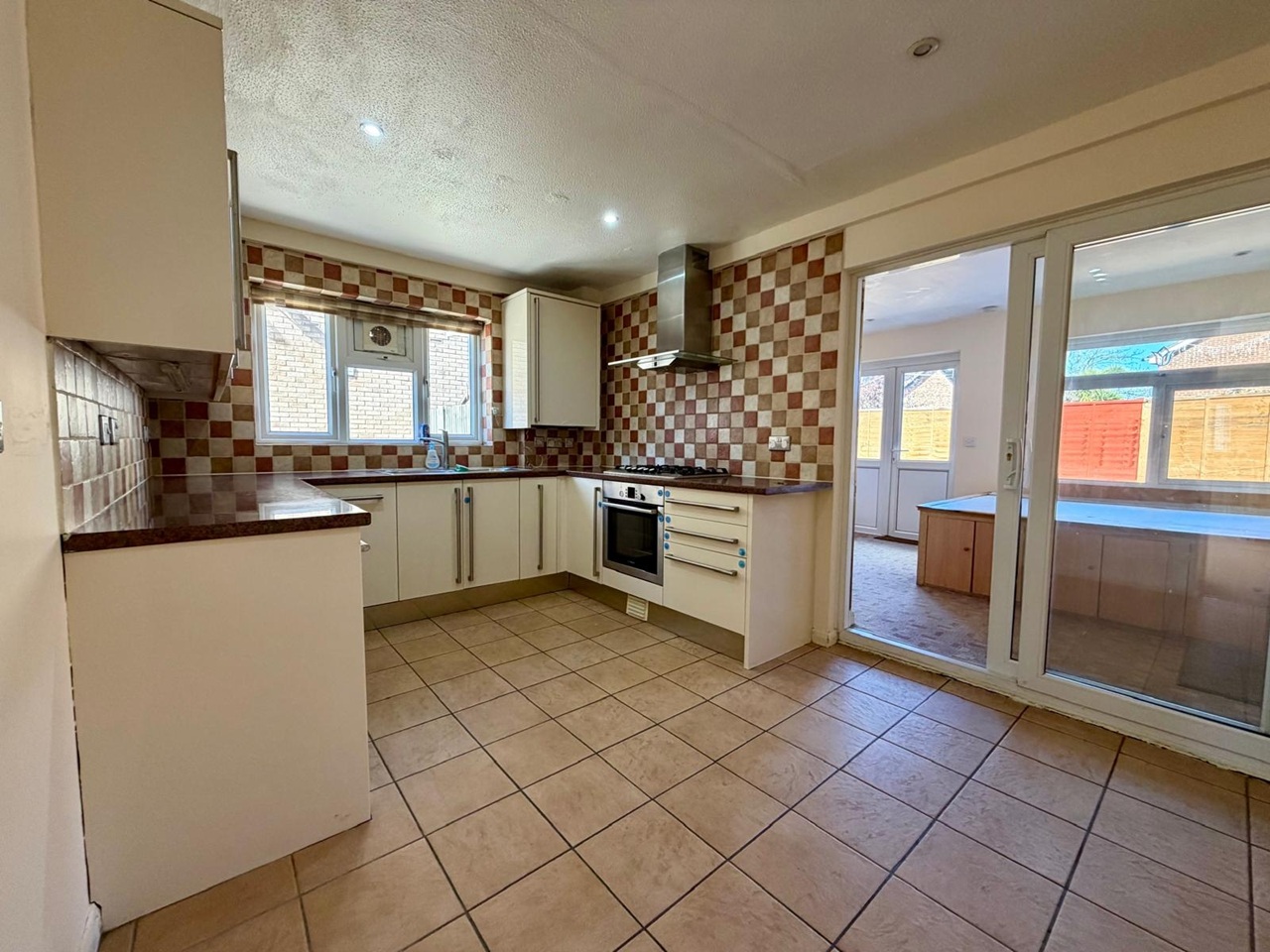 Spacious 4-Bedroom Mid-Terrace House with Garden & Parking – Alba Close, UB4